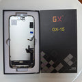 Hard OLED screen for iPhone 15 in its tray, beside its labelled box