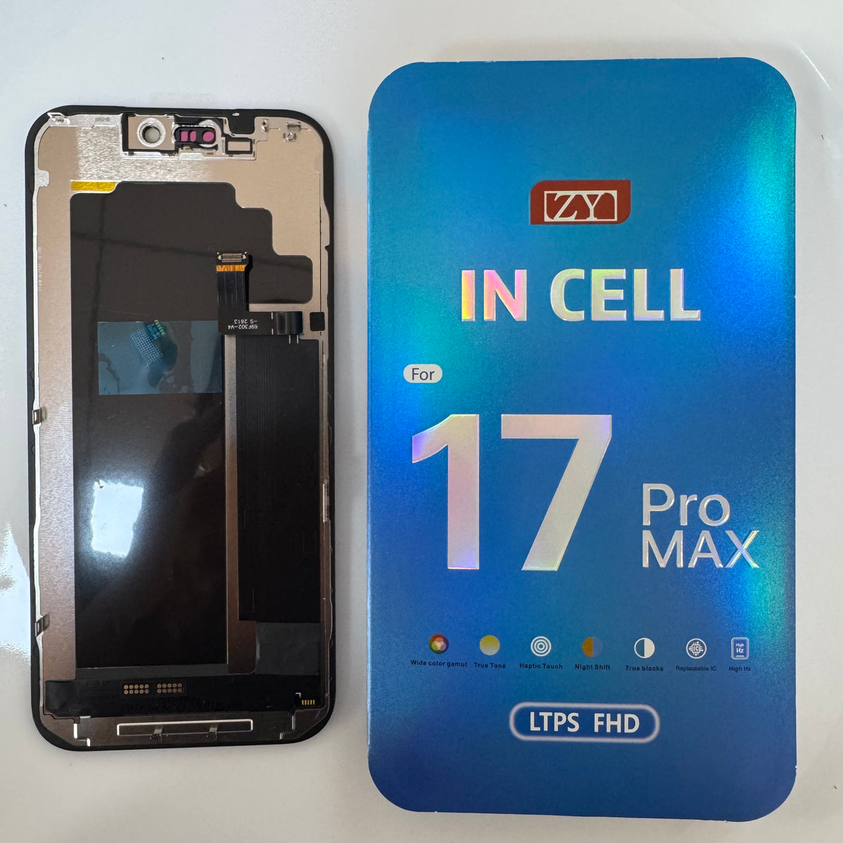 FHD incell LCD screen for iPhone 17 Pro Max beside its box